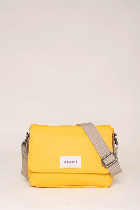 BRAKEBURN YELLOW ROO POUCH CROSS BODY BAG (SS21)